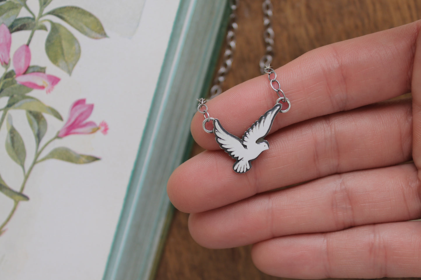 Handcrafted sterling silver Love Bird Necklace with a delicate bird pendant and adjustable oxidized chain, perfect for Valentine's Day.