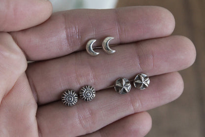 Celestial sterling silver stud earrings, handmade jewelry, celestial earrings, moon and star earrings, artisan earrings, sterling silver earrings, eco-friendly jewelry, nature-inspired jewelry, minimalistic jewelry, sustainable jewelry, celestial stud earrings, everyday earrings, handmade earrings, ethical jewelry, recycled silver earrings, celestial jewelry, silver studs, celestial-themed jewelry, artisan silver earrings, star and moon jewelry