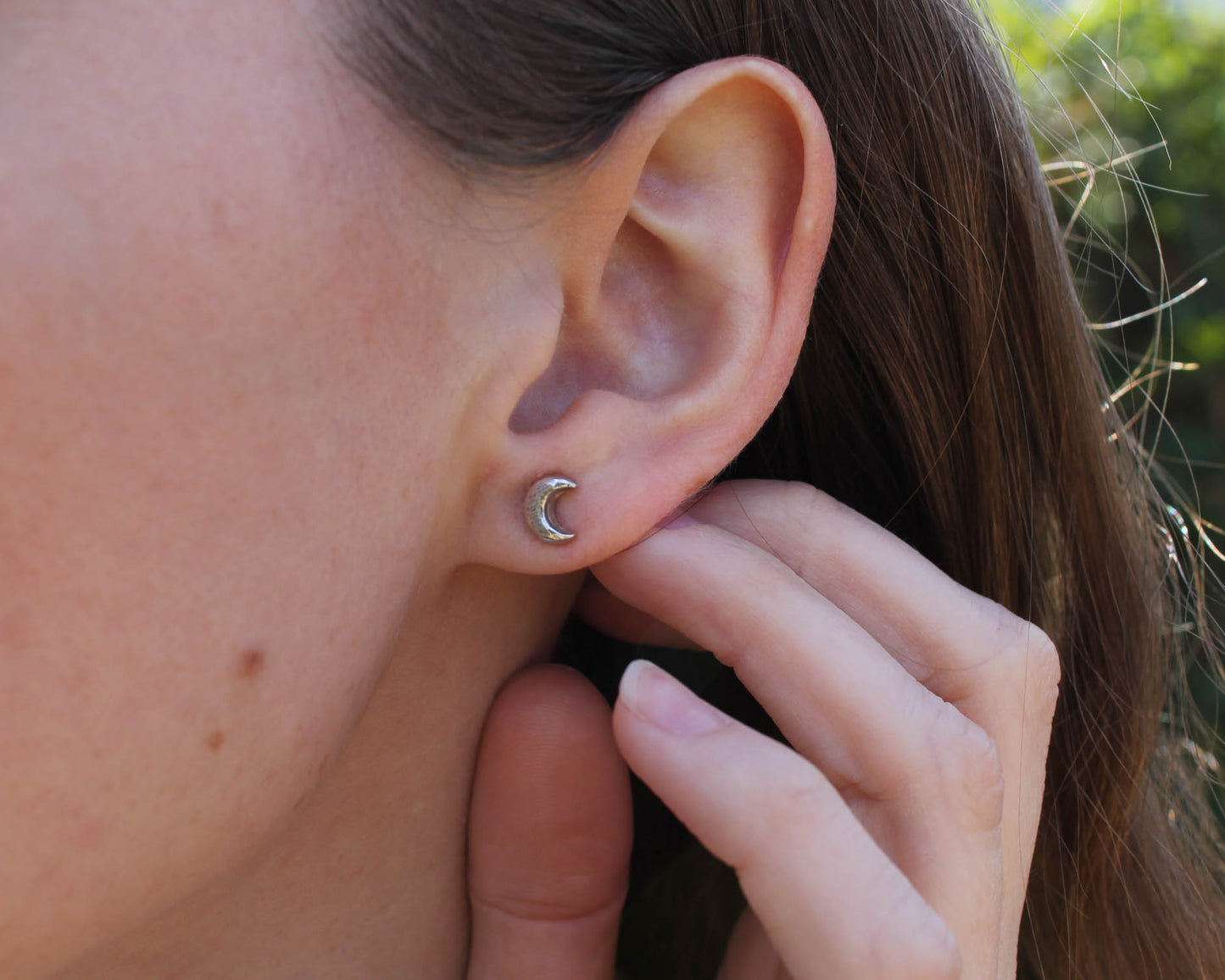 Celestial sterling silver stud earrings, handmade jewelry, celestial earrings, moon and star earrings, artisan earrings, sterling silver earrings, eco-friendly jewelry, nature-inspired jewelry, minimalistic jewelry, sustainable jewelry, celestial stud earrings, everyday earrings, handmade earrings, ethical jewelry, recycled silver earrings, celestial jewelry, silver studs, celestial-themed jewelry, artisan silver earrings, star and moon jewelry