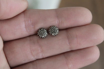 Celestial sterling silver stud earrings, handmade jewelry, celestial earrings, moon and star earrings, artisan earrings, sterling silver earrings, eco-friendly jewelry, nature-inspired jewelry, minimalistic jewelry, sustainable jewelry, celestial stud earrings, everyday earrings, handmade earrings, ethical jewelry, recycled silver earrings, celestial jewelry, silver studs, celestial-themed jewelry, artisan silver earrings, star and moon jewelry