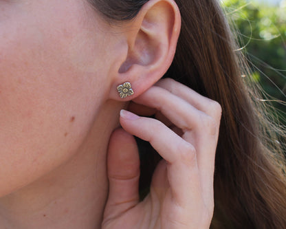 floral sterling silver stud earrings, sterling silver stud earrings, floral earrings, sustainable jewelry, handmade earrings, eco-friendly earrings, nature-inspired earrings, recycled silver jewelry, floral silver studs, artisan jewelry, ethical jewelry, minimalist earrings, everyday earrings, unique jewelry design, heirloom-quality earrings, handcrafted earrings, eco-conscious jewelry, floral stud earrings for women, silver flower earrings, dainty silver earrings