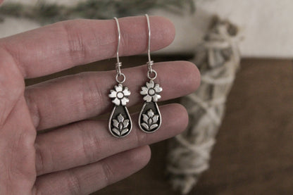 eco-friendly earrings, handmade sterling silver earrings, floral earrings, gemstone earrings, artisan jewelry, sustainable jewelry, nature-inspired jewelry, recycled silver earrings, handmade floral earrings, eco-conscious fashion, unique earrings, ethical jewelry, handcrafted earrings, sterling silver jewelry, boho earrings, flower earrings, sustainable fashion, heirloom quality jewelry, gemstone jewelry, handmade in the USA